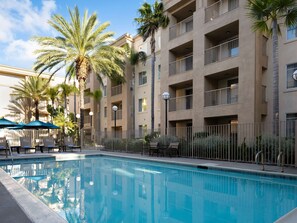 Outdoor pool, open 10:00 AM to 10:00 PM, pool umbrellas, sun loungers