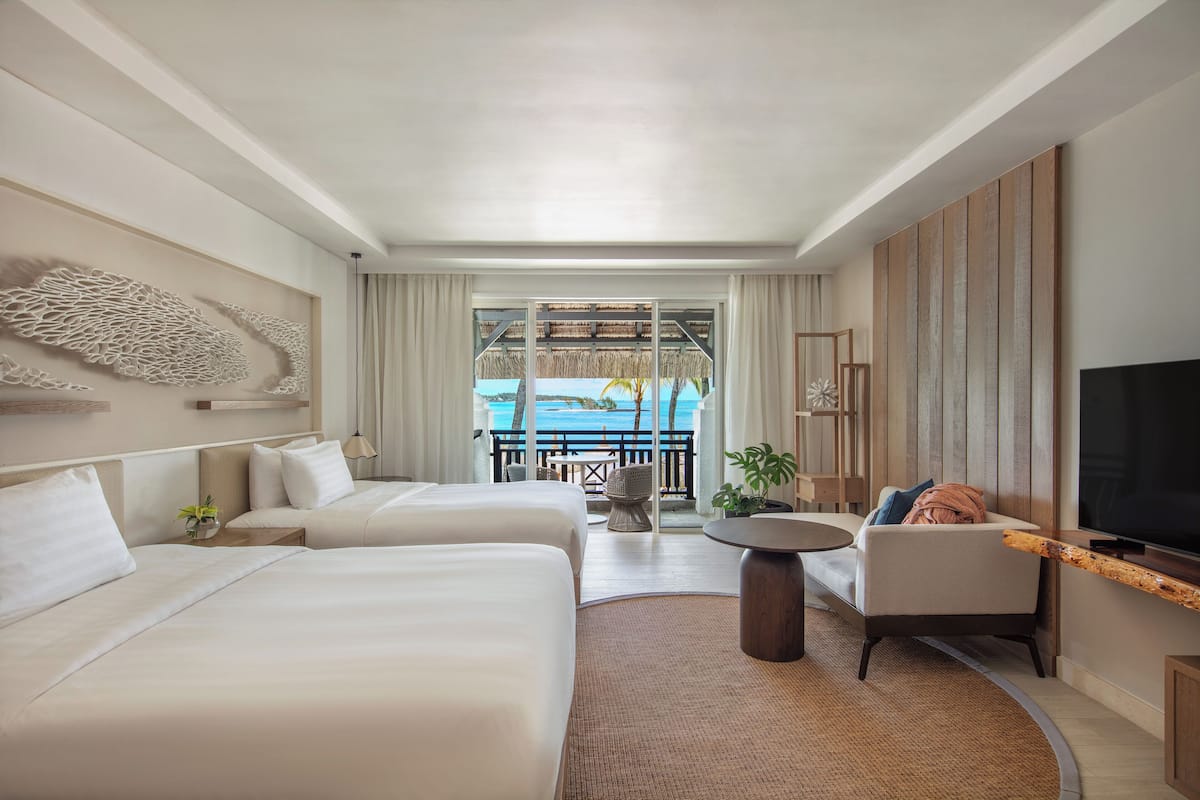 Premium bedding, memory-foam beds, minibar, in-room safe