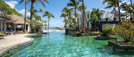 2 outdoor pools, pool umbrellas, pool loungers