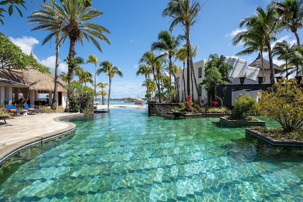 2 outdoor pools, open 8:30 AM to 7:00 PM, pool umbrellas, sun loungers