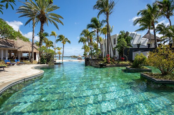 2 outdoor pools, pool umbrellas, sun loungers