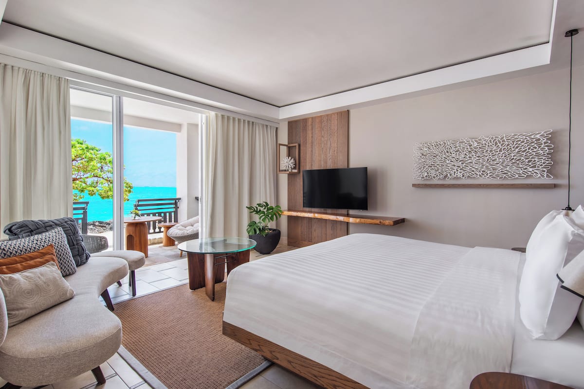 Frangipani Beach Front Junior Suite King | Premium bedding, memory-foam beds, minibar, in-room safe