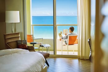 Hypo-allergenic bedding, down comforters, pillowtop beds, in-room safe at Marriott Stanton South Beach
