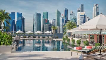 Outdoor pool, pool umbrellas, sun loungers