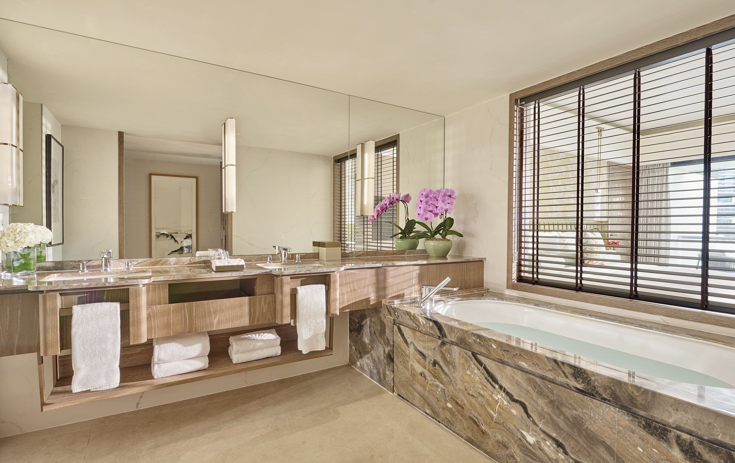 Separate bathtub and shower, designer toiletries, hair dryer, bathrobes
