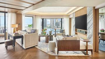 Een 60-inch lcd-televisie met digitale zenders en een televisie