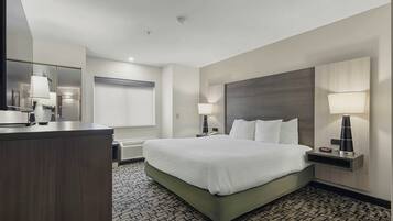 Chambre Standard, 1 trÚs grand lit, accessible aux personnes à mobilité réduite, non-fumeurs | Surmatelas, bureau, fer et planche à repasser, Wi-Fi gratuit