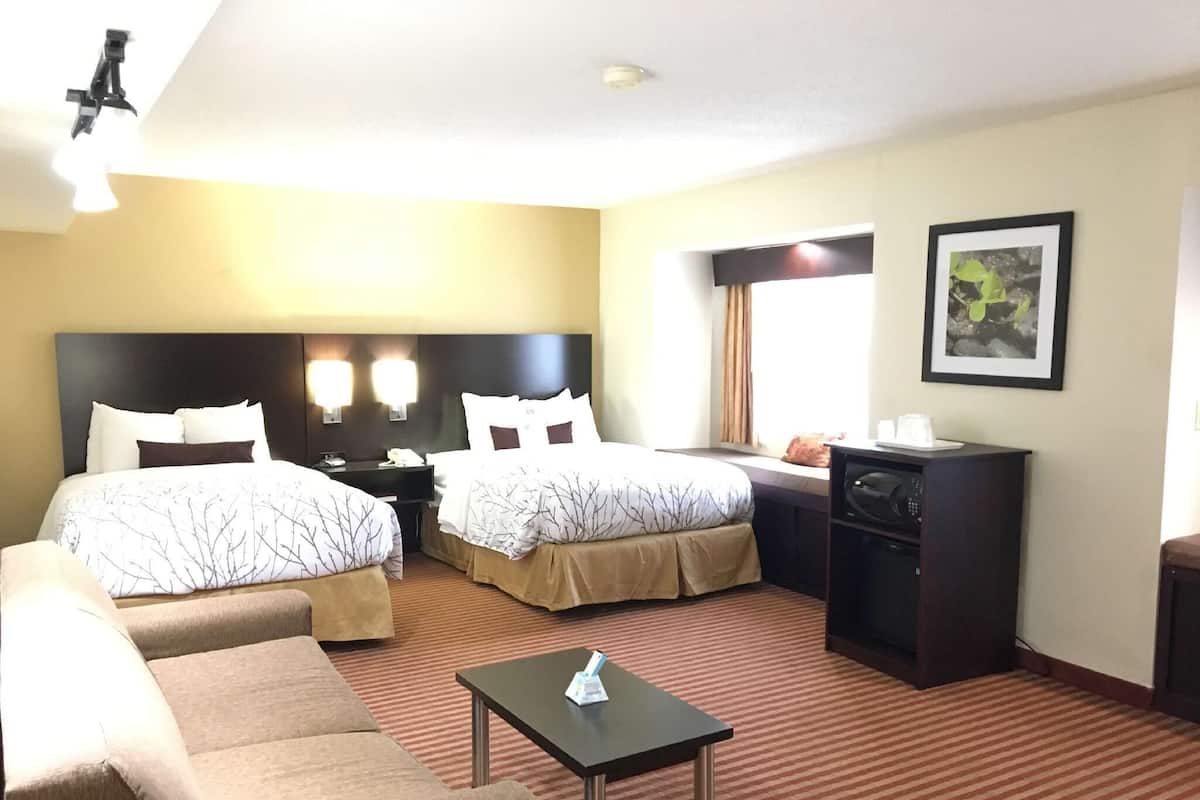 Premium bedding, desk, laptop workspace, iron/ironing board