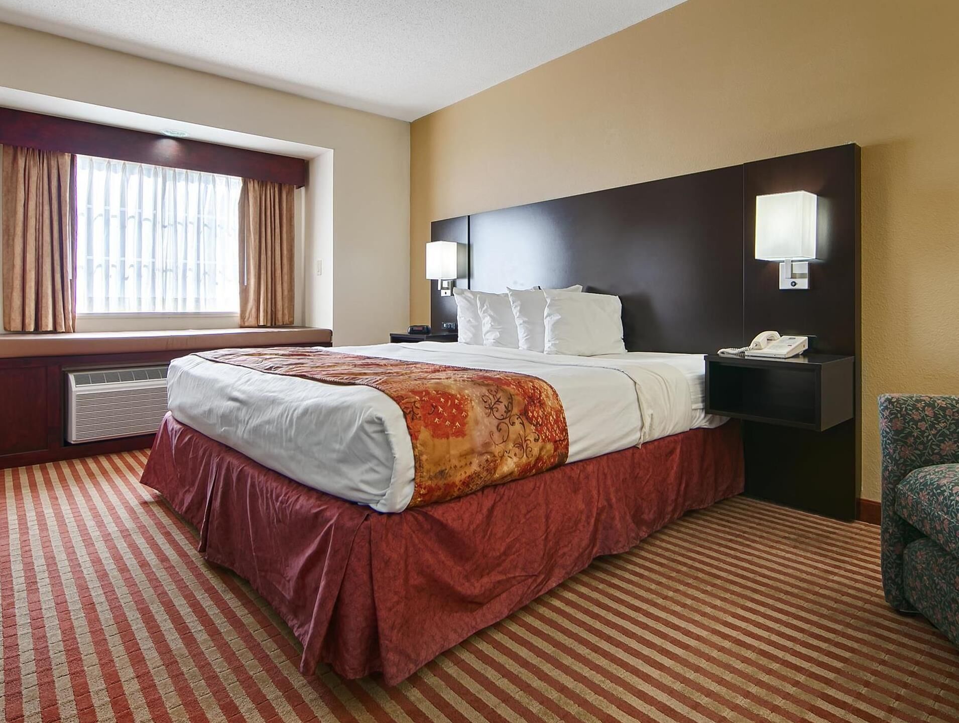 Premium bedding, desk, laptop workspace, iron/ironing board