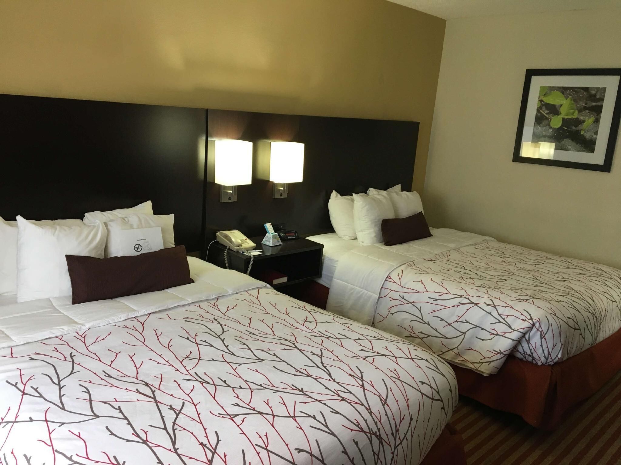 Premium bedding, desk, laptop workspace, iron/ironing board