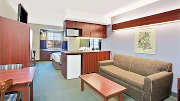 Desk, laptop workspace, blackout curtains, iron/ironing board