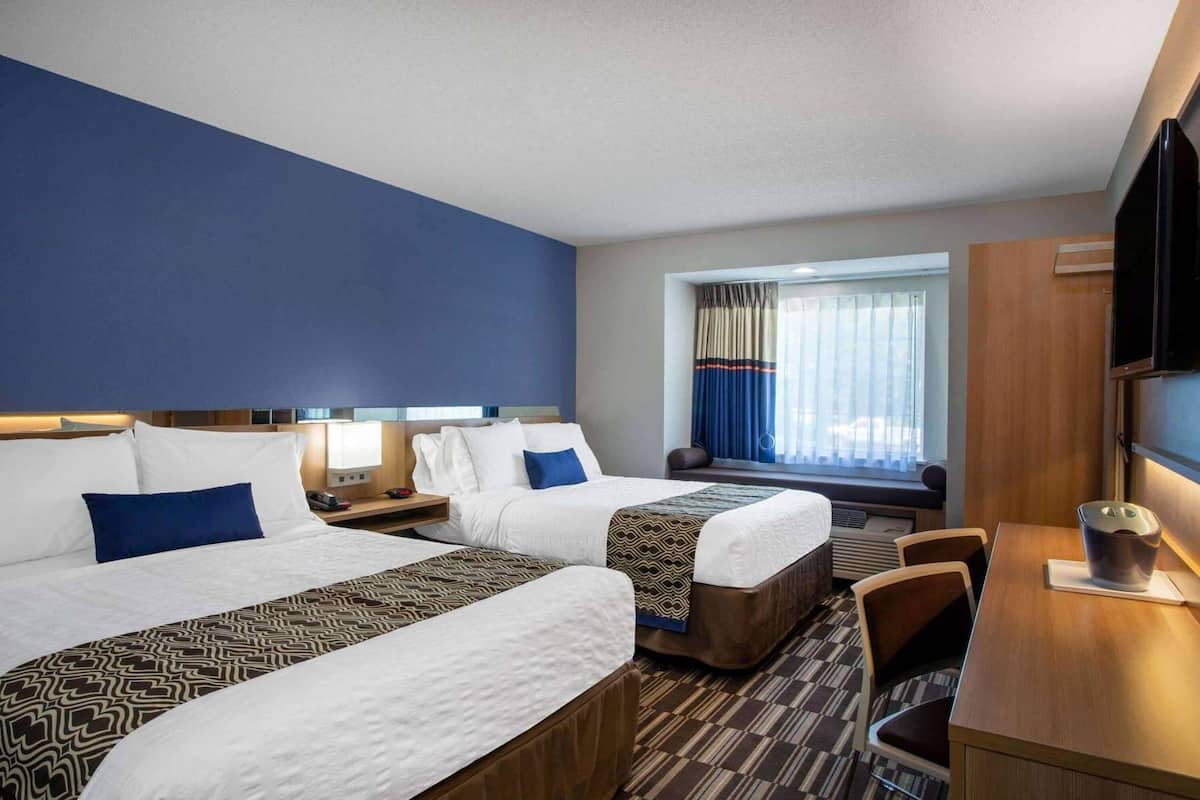 In-room safe, desk, iron/ironing board, free cribs/infant beds