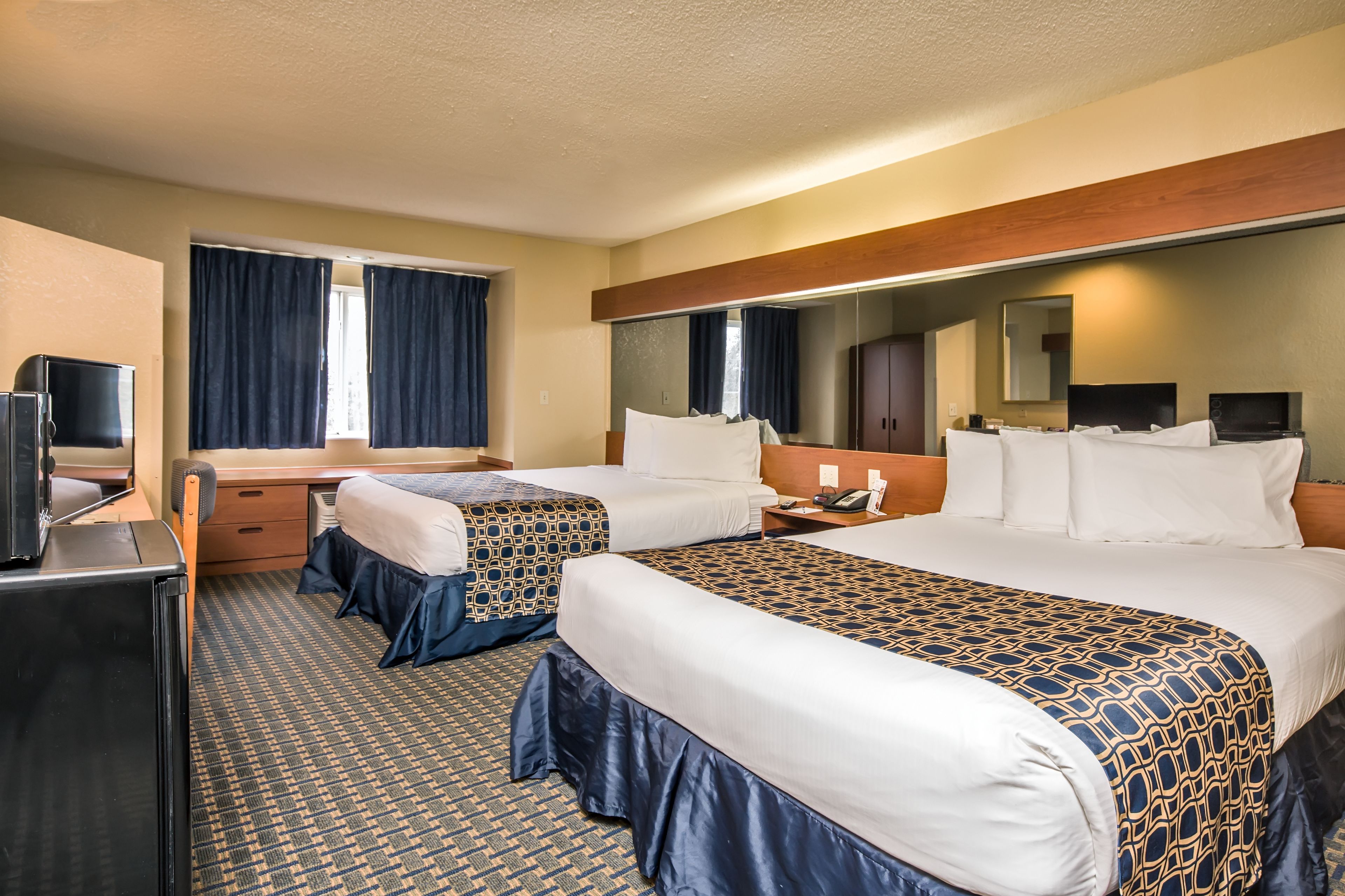 in-room safe, desk, blackout curtains, iron/ironing board