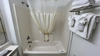 Combined shower/tub, hair dryer, towels at Baymont by Wyndham Orlando/International Dr/Universal Blvd