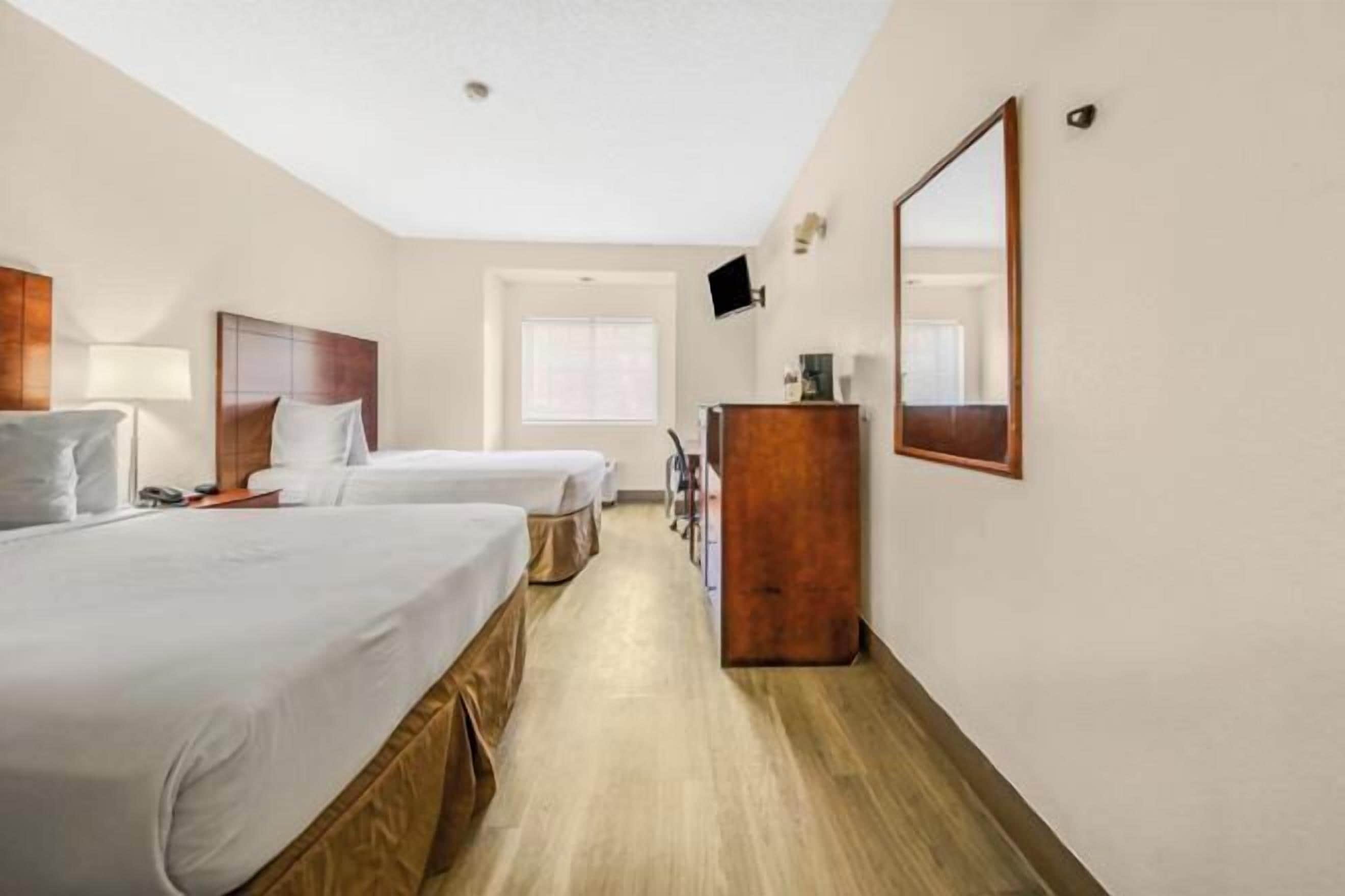 Individually furnished, desk, blackout drapes, iron/ironing board