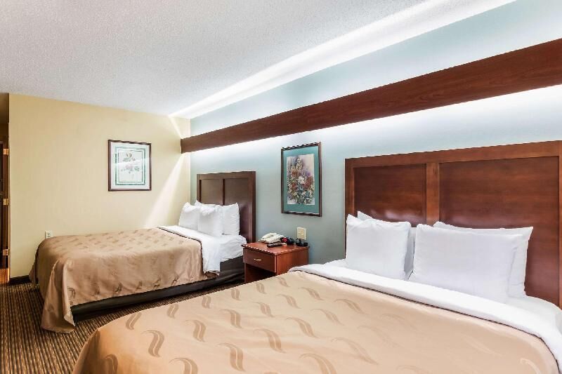 Premium bedding, desk, laptop workspace, soundproofing