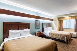 Premium bedding, desk, laptop workspace, soundproofing
