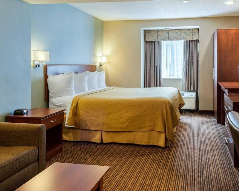 Premium bedding, desk, laptop workspace, soundproofing