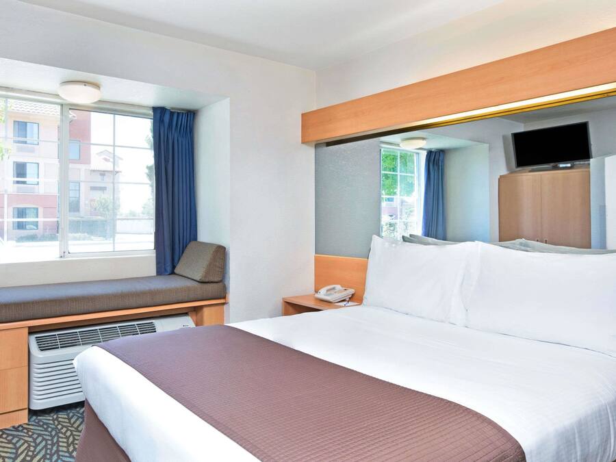 Desk, blackout curtains, free cots/infant beds, rollaway beds