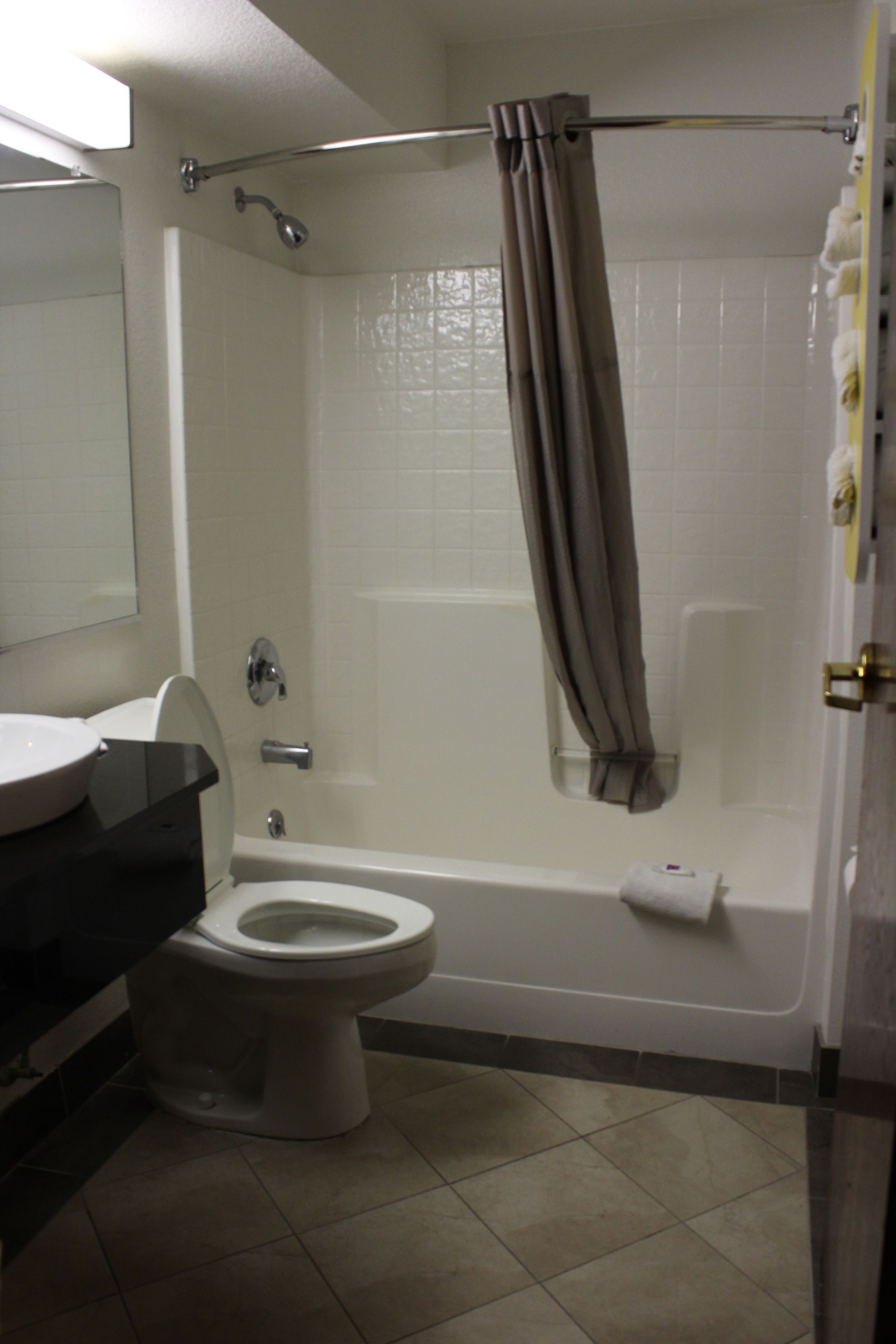 Combined shower/tub, hair dryer, towels, soap