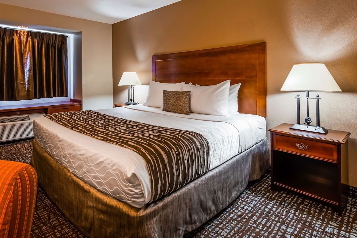 Individually furnished, desk, laptop workspace, iron/ironing board