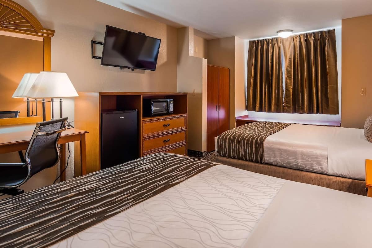 Individually furnished, desk, laptop workspace, iron/ironing board