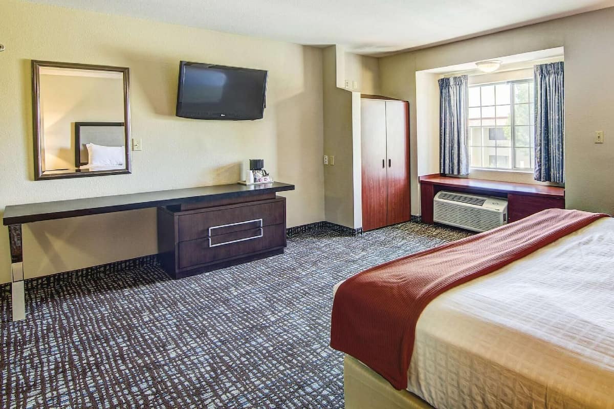 Individually furnished, desk, laptop workspace, iron/ironing board