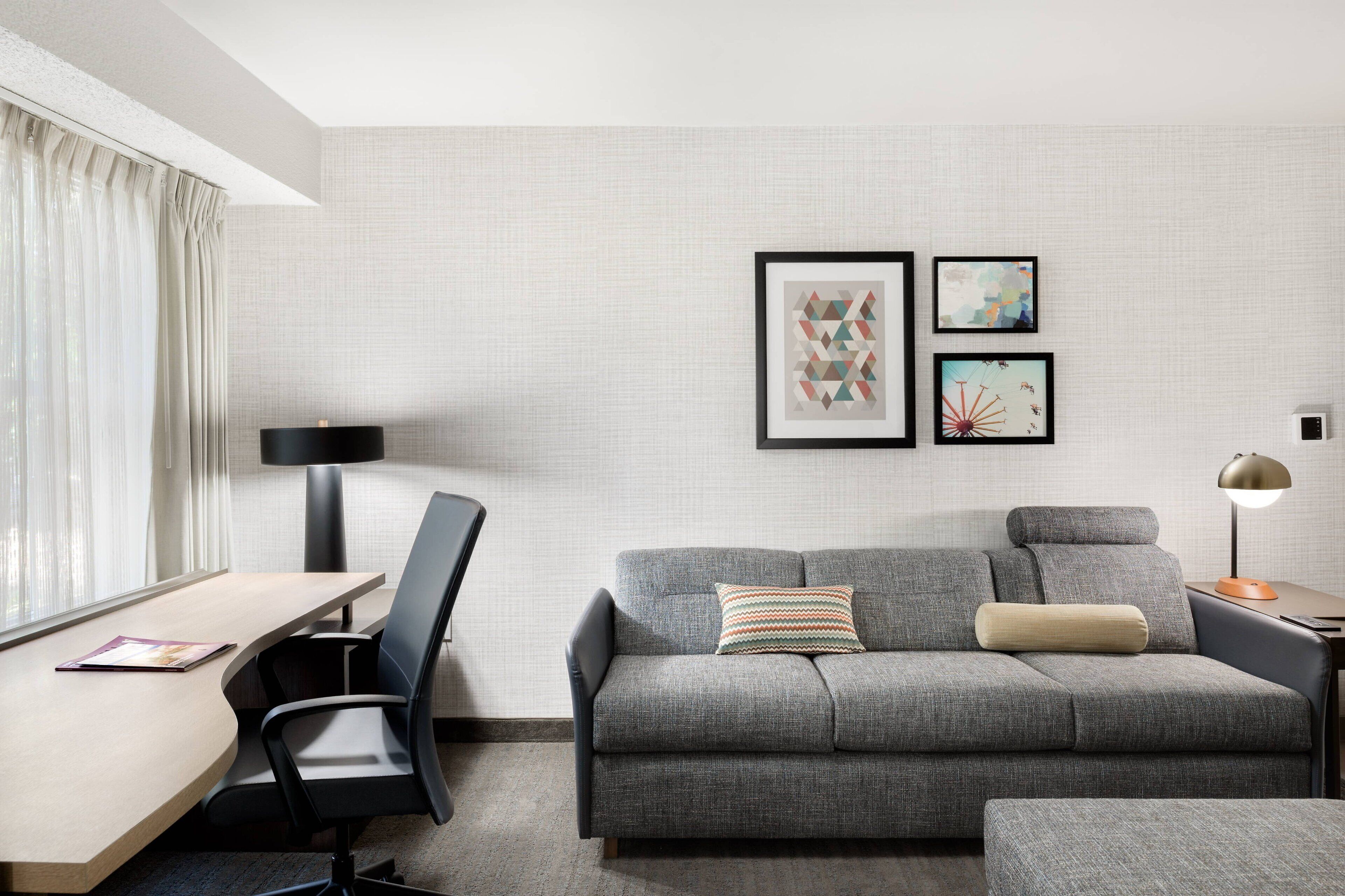 premium bedding, pillow-top beds, desk, laptop workspace