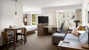 Premium bedding, pillow-top beds, desk, laptop workspace