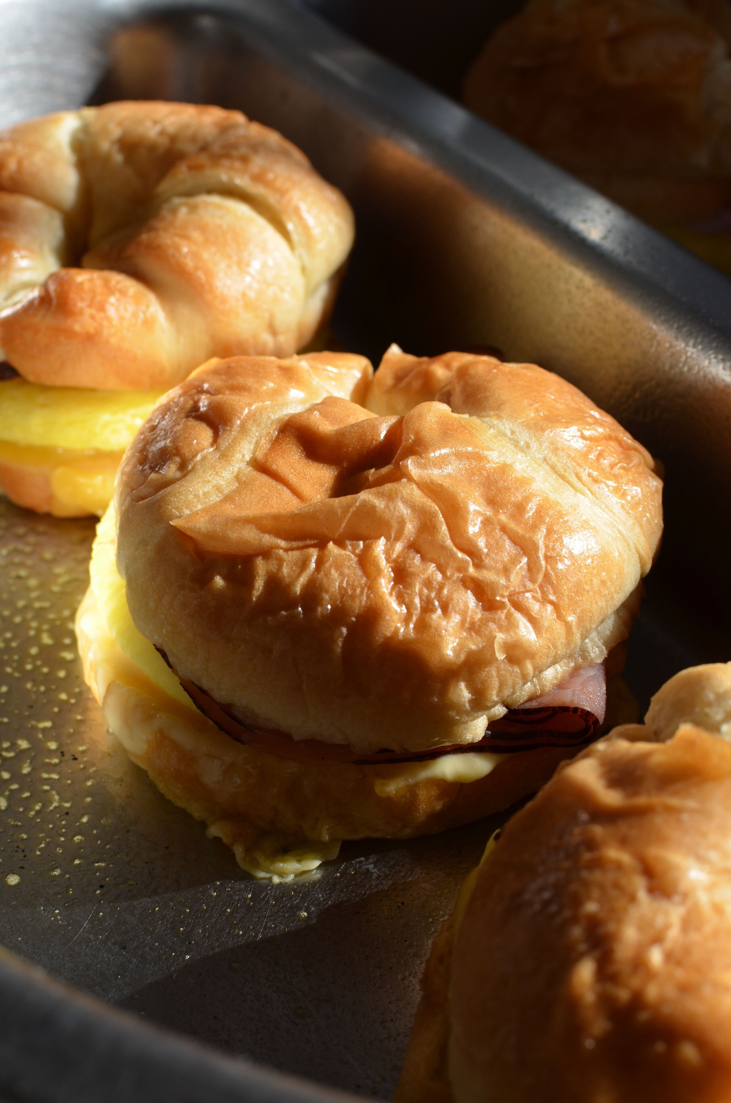 A tray with several sandwiches.