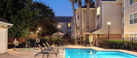 Outdoor pool, open 9:00 AM to 10:00 PM, pool loungers