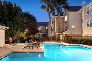 Outdoor pool, open 9:00 AM to 10:00 PM, sun loungers