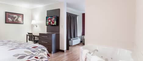 Suite, 1 King Bed, Non Smoking, Jetted Tub | Desk, blackout drapes, iron/ironing board, free WiFi