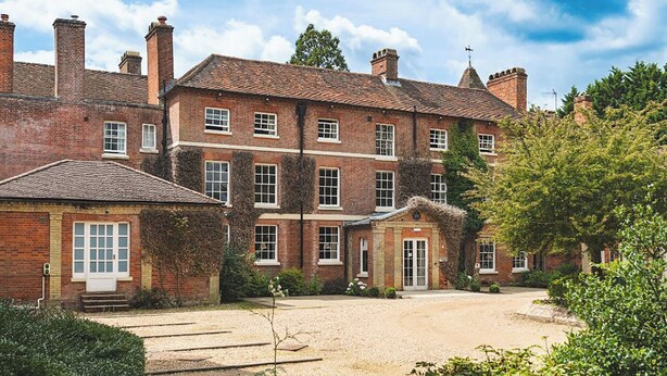 A large brick building with multiple windows and a gravel driveway. - Bartley Lodge Hotel (Southampton)