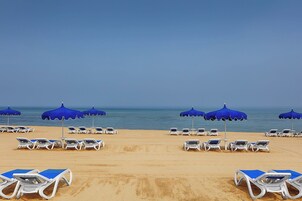 Private beach, sun loungers, beach umbrellas