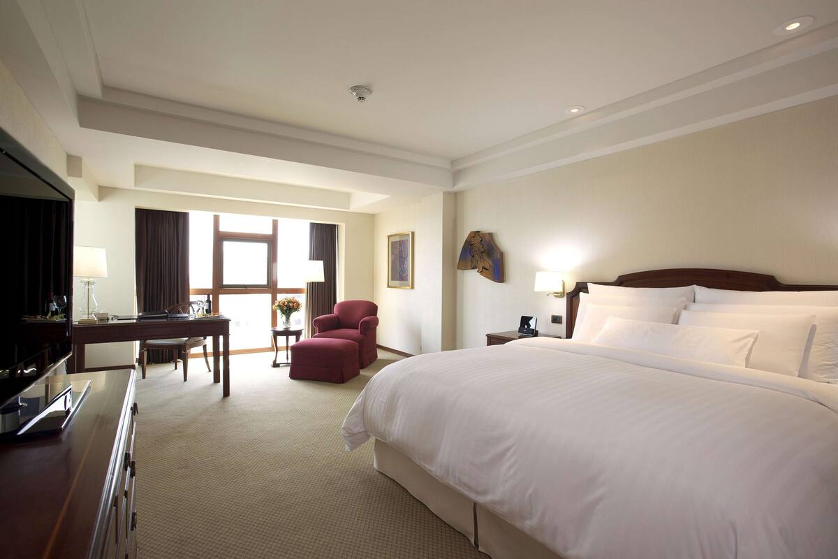 Premium bedding, down comforters, memory foam beds, minibar