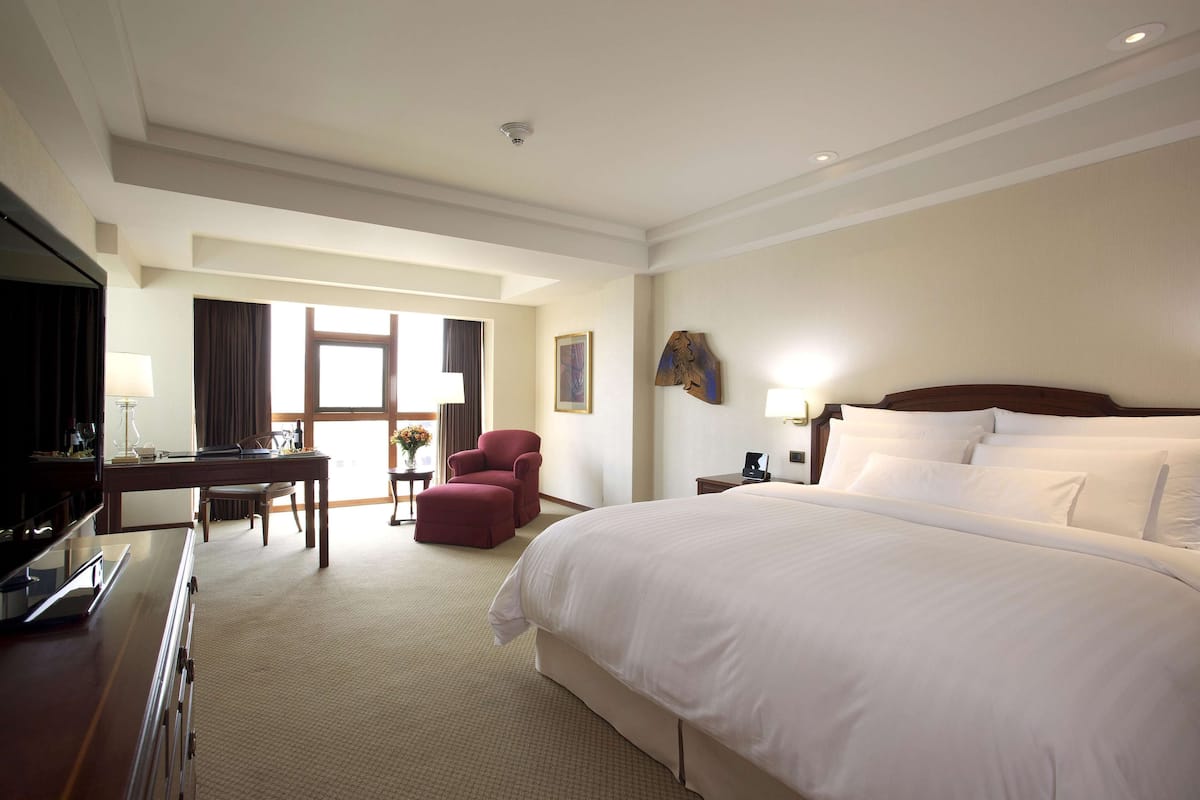 Premium bedding, down comforters, memory foam beds, minibar