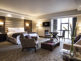 Premium bedding, down comforters, memory foam beds, minibar