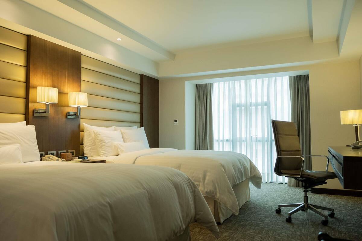 Premium bedding, down comforters, memory foam beds, minibar