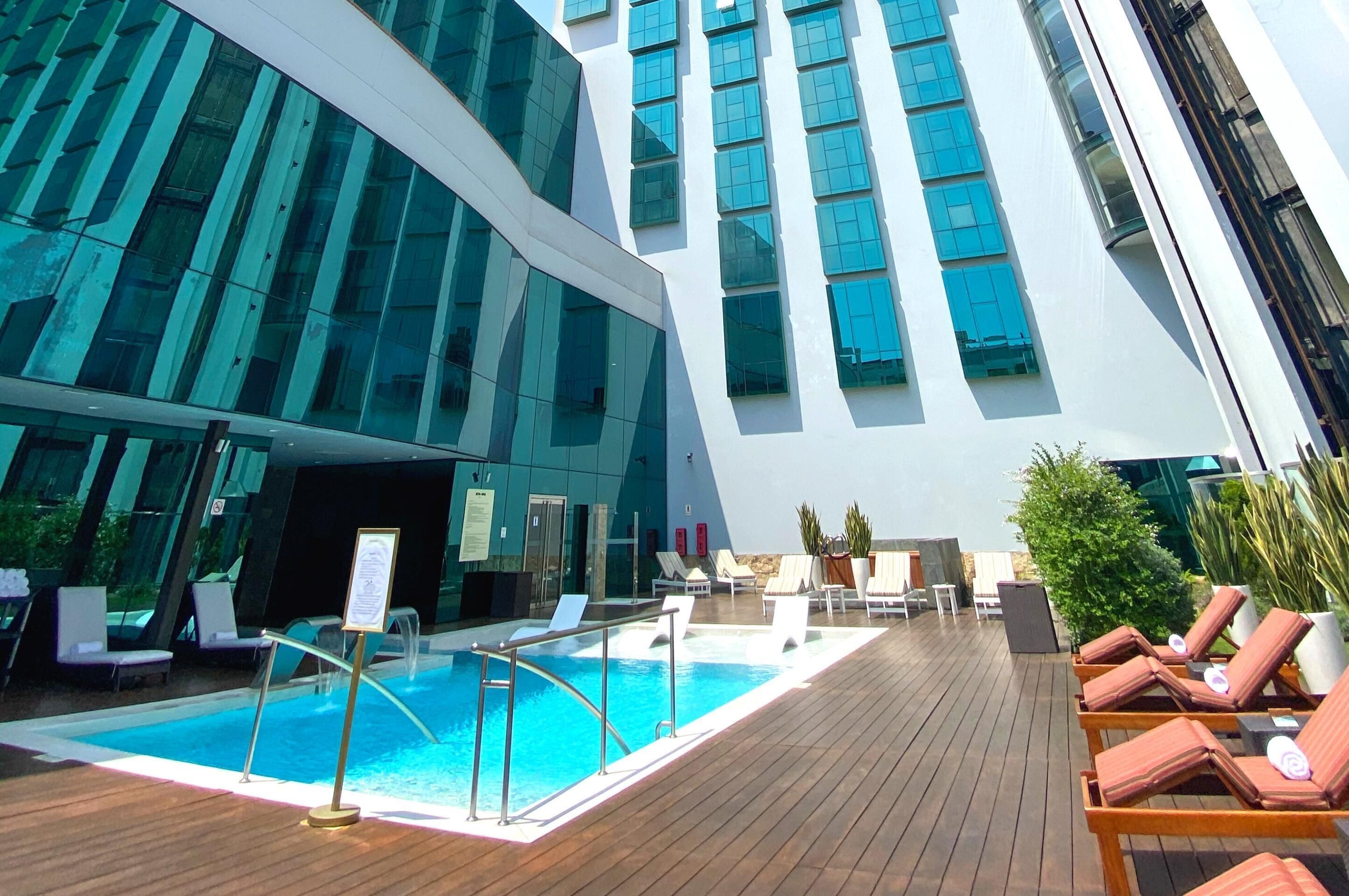 indoor pool, outdoor pool, open 7:00 am to 6:00 pm, pool loungers