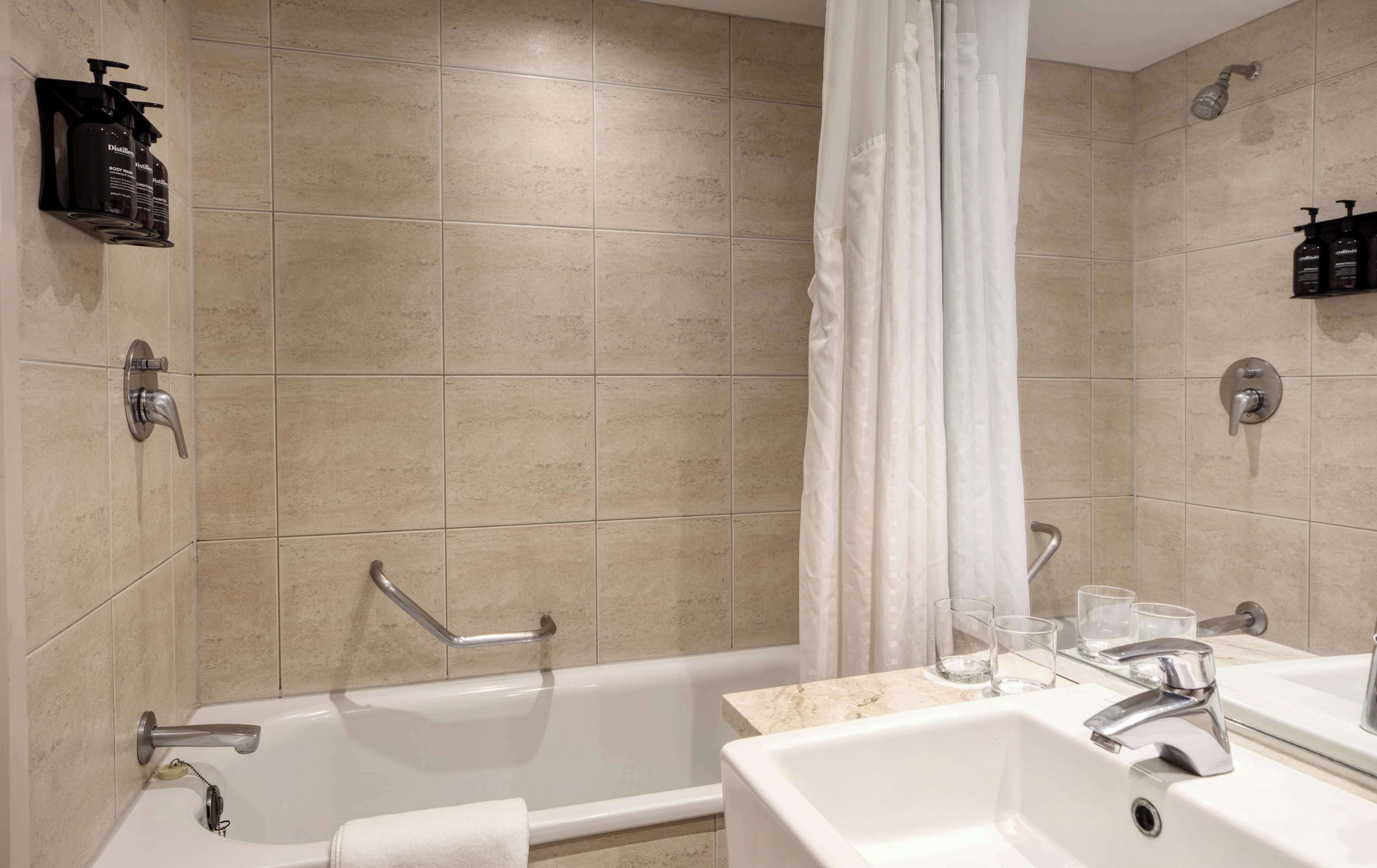 combined shower/bathtub, free toiletries, hair dryer, towels