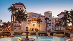 A large, ornate building with a fountain in the courtyard. - Casa Monica Resort & Spa, Autograph Collection (St. Augustine)