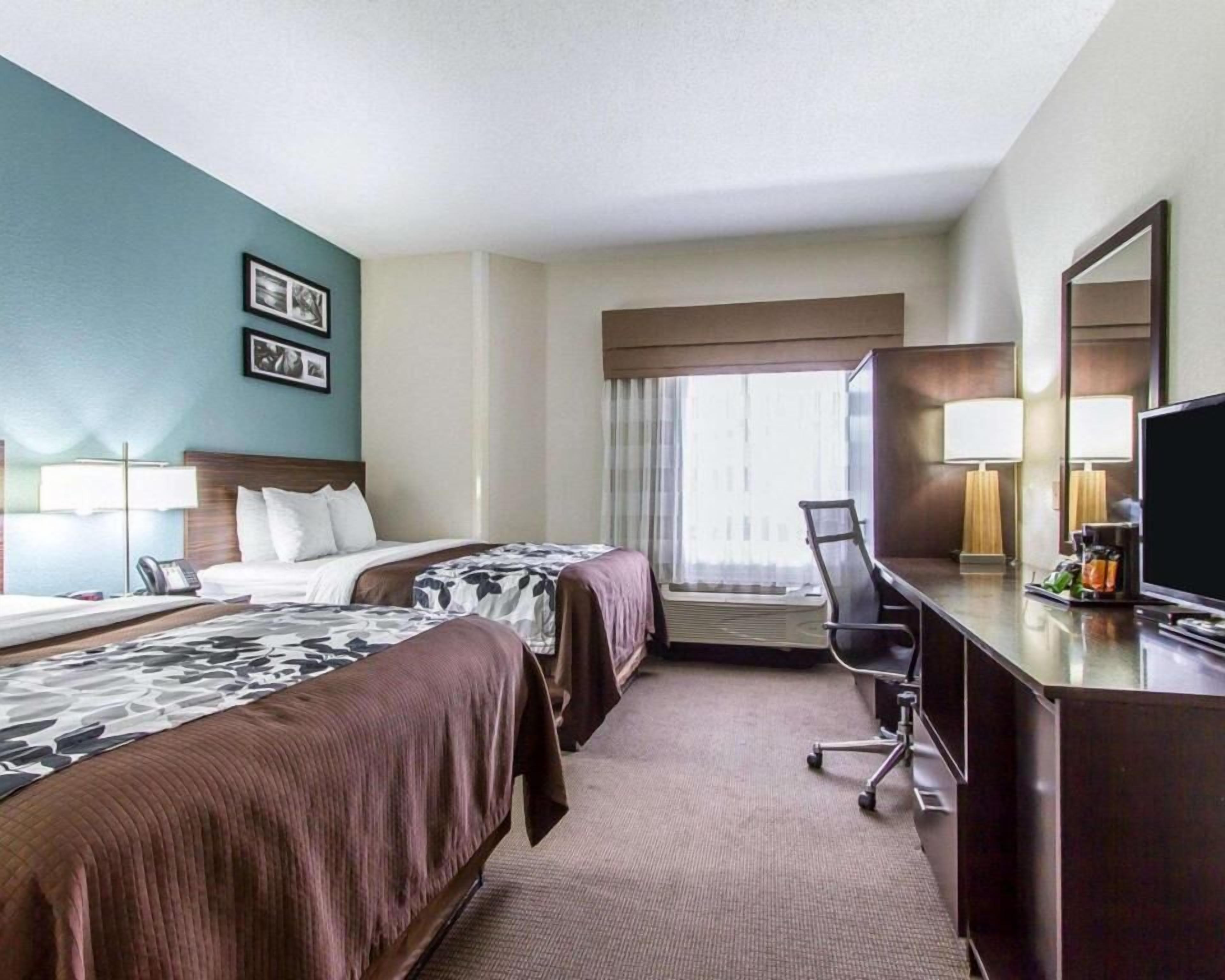 Premium bedding, pillowtop beds, desk, laptop workspace