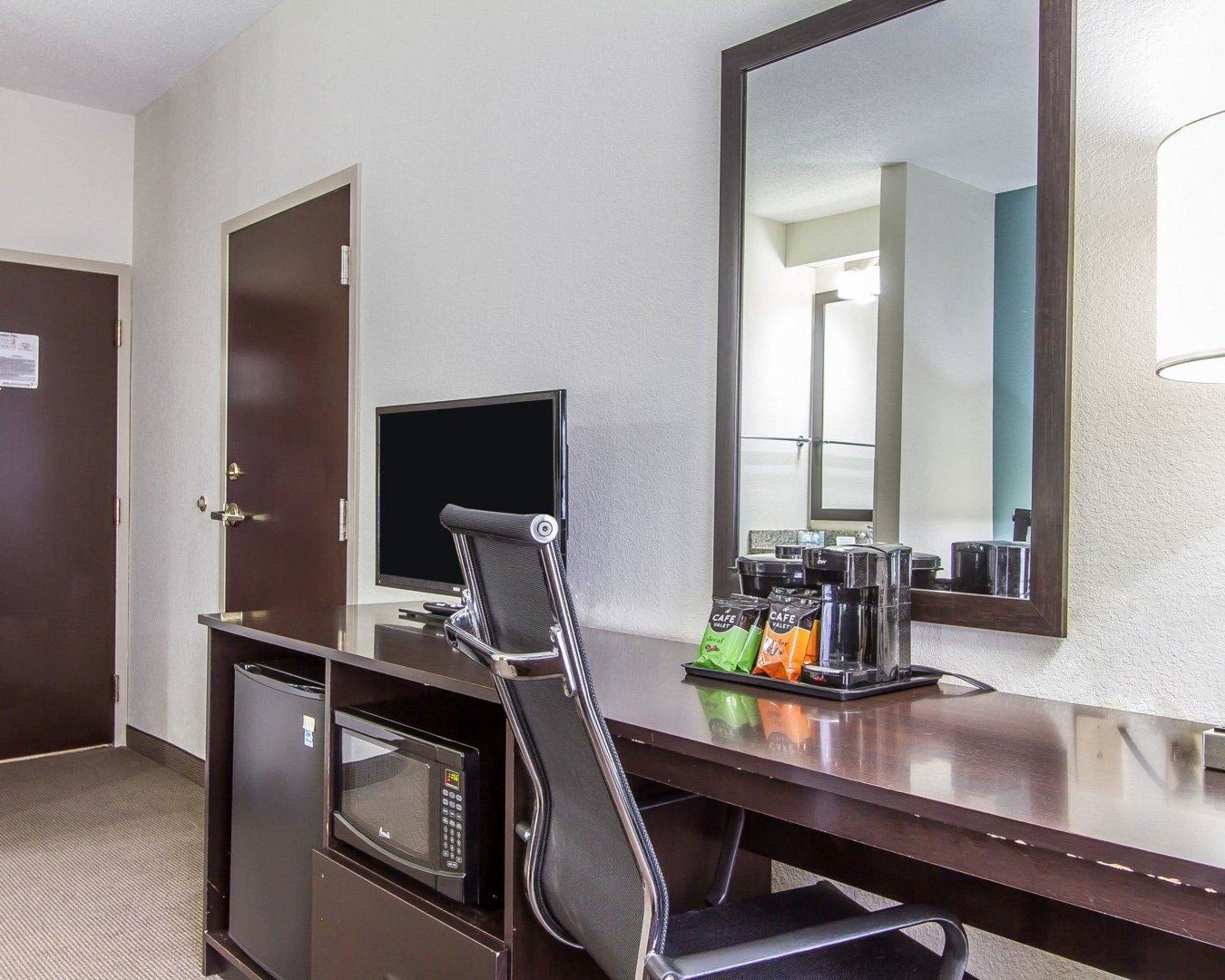 Premium bedding, pillow-top beds, desk, laptop workspace