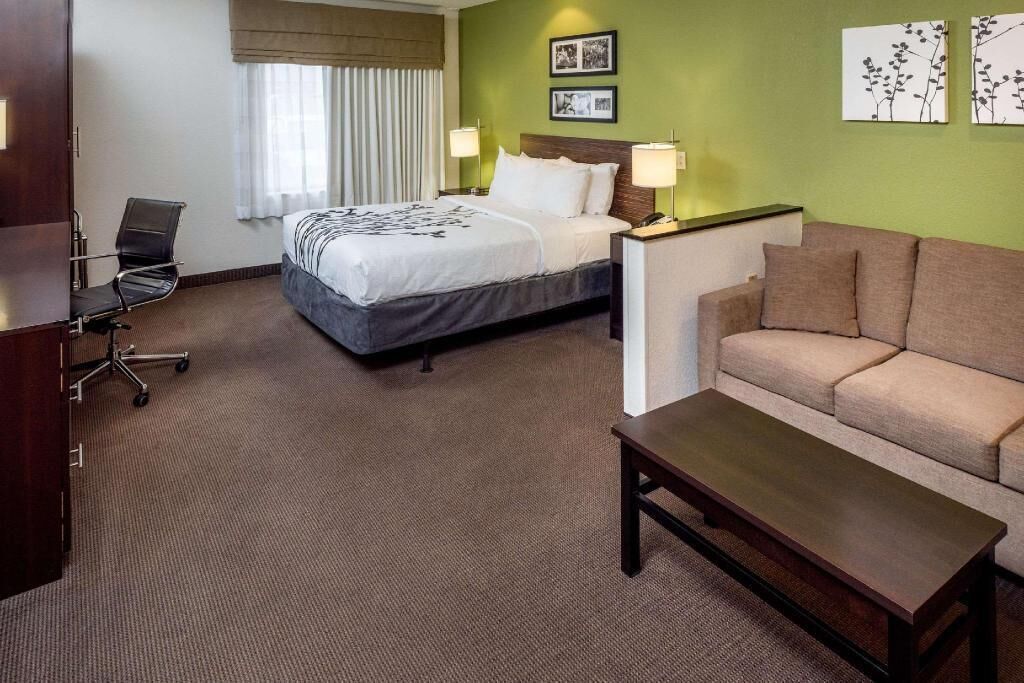 Premium bedding, blackout drapes, iron/ironing board