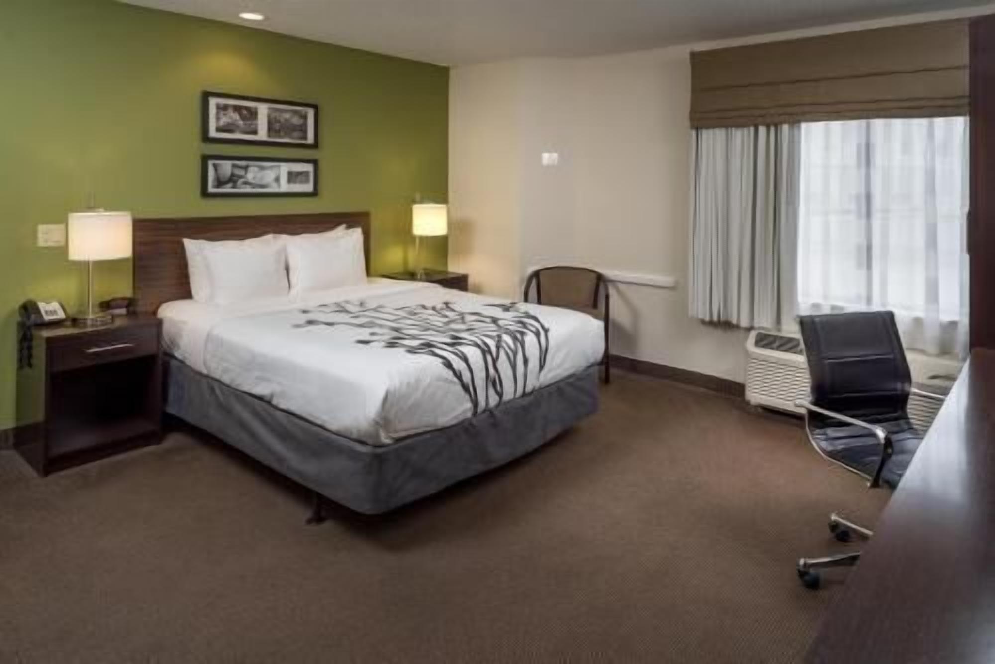Premium bedding, blackout drapes, iron/ironing board