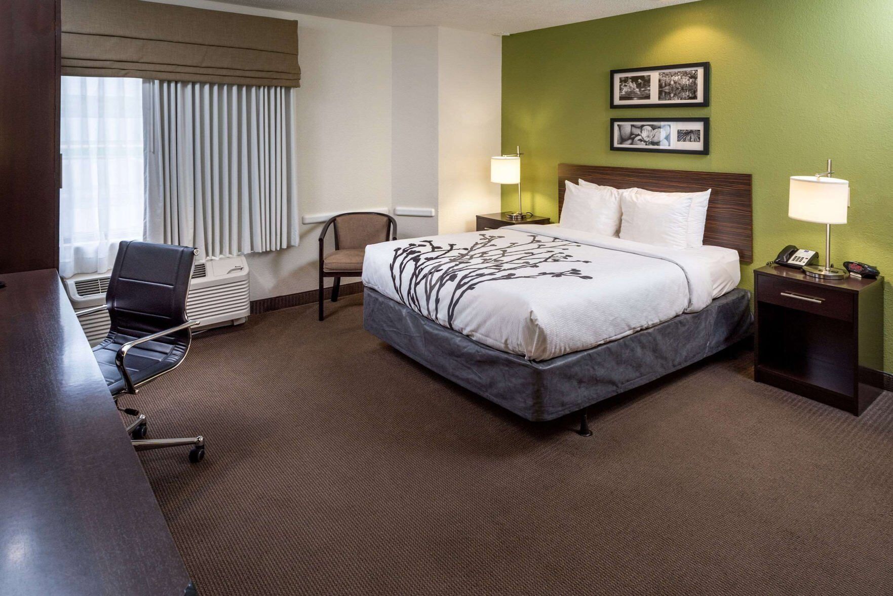 Premium bedding, blackout drapes, iron/ironing board