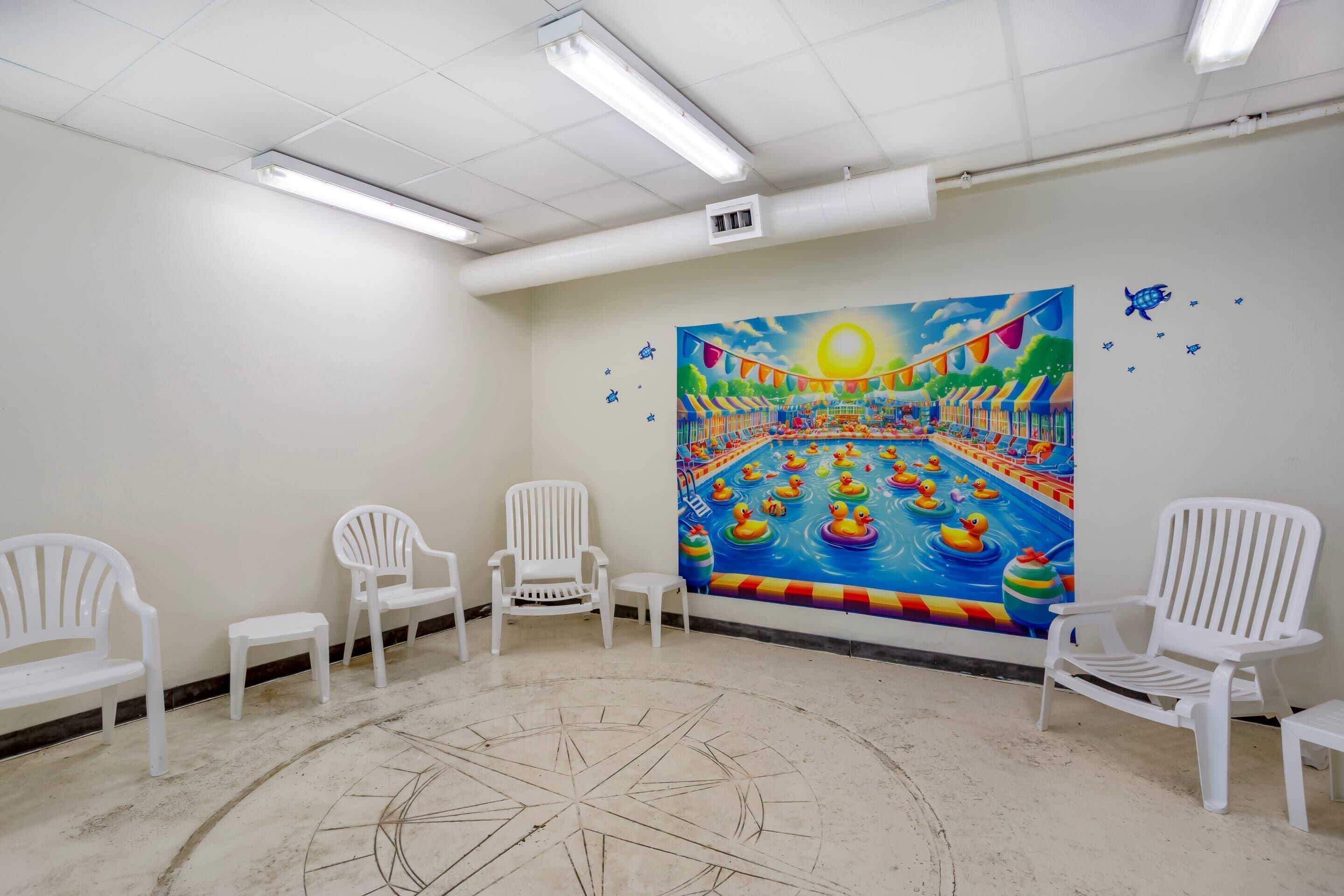 Indoor pool, open 9:00 AM to 10:00 PM, pool loungers