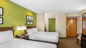 Premium bedding, blackout drapes, iron/ironing board