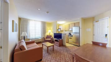 Two Bedroom Suite | Living area | 32-inch flat-screen TV with digital channels, TV